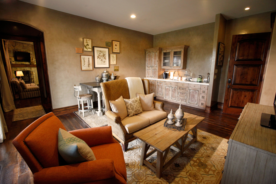 The Lodge accommodation living area with seating and coffee table